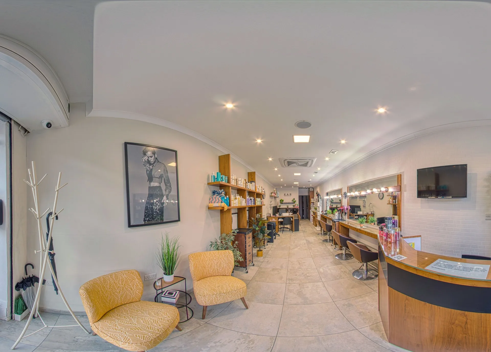 Inside XAR: styling stations, product shelving and the reception desk